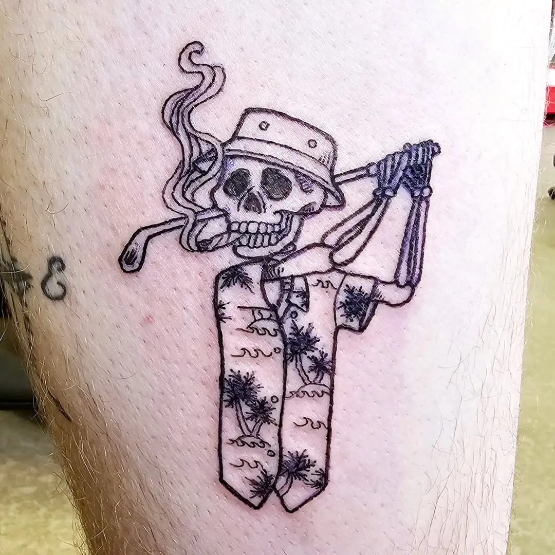 Playful Skull Golf Tattoo with Hawaiian Vibes