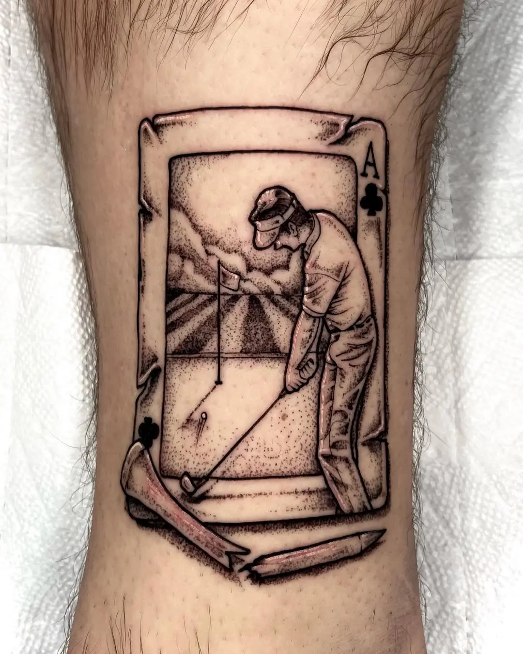 Unique golf tattoo featuring playing card design