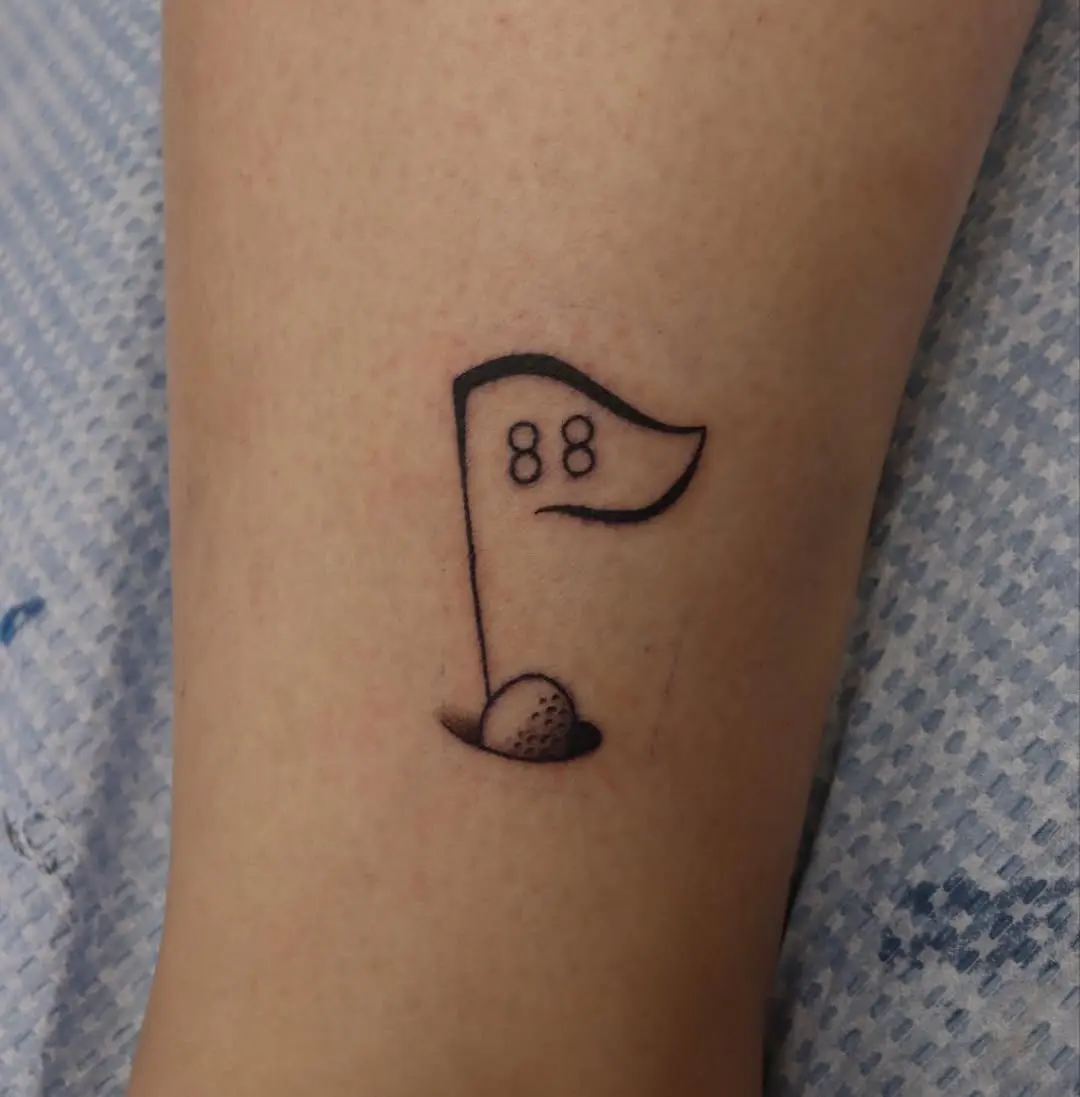 Unique golf flag tattoo featuring the number 88