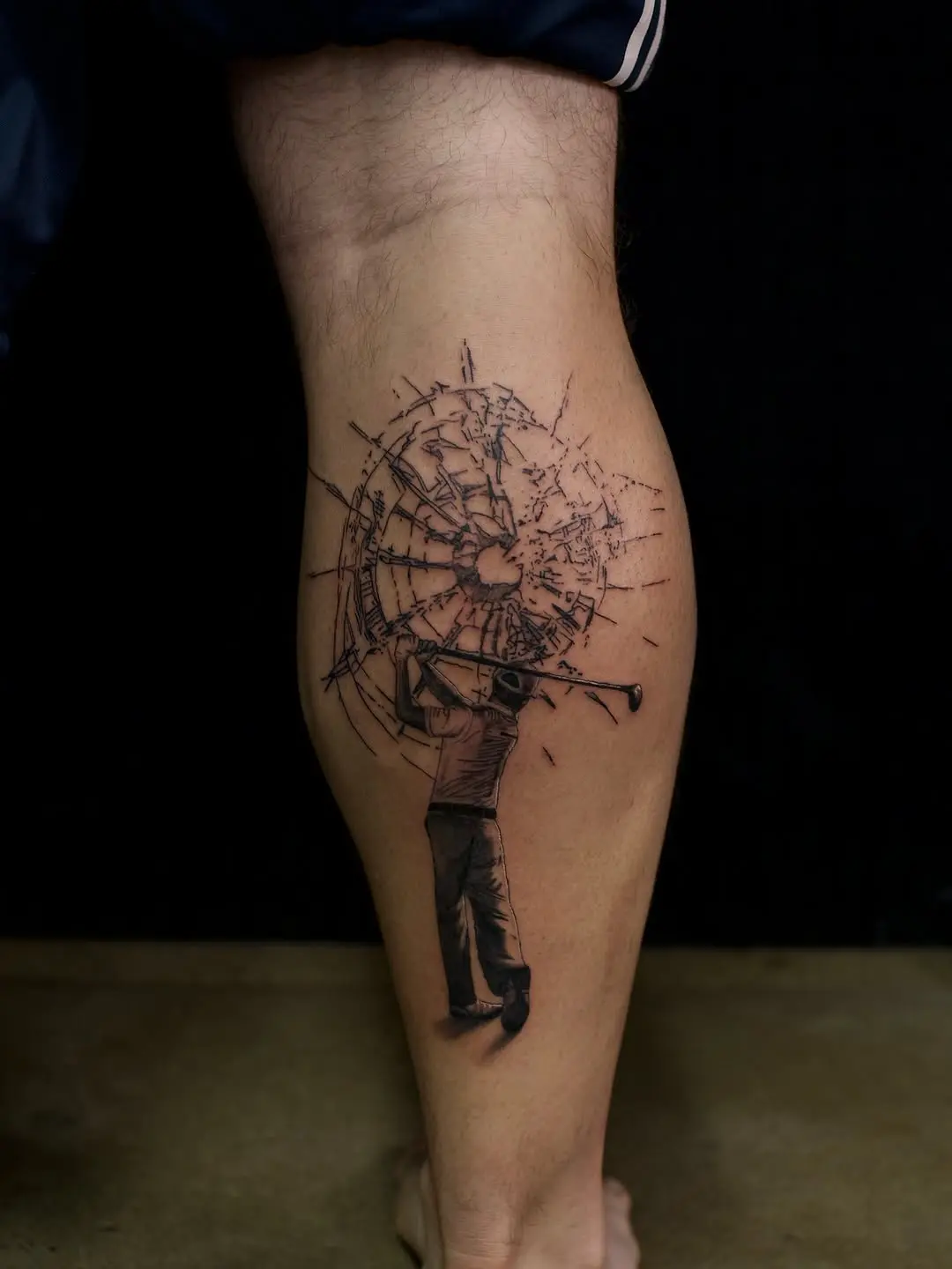 Dynamic golfer tattoo captures swing motion