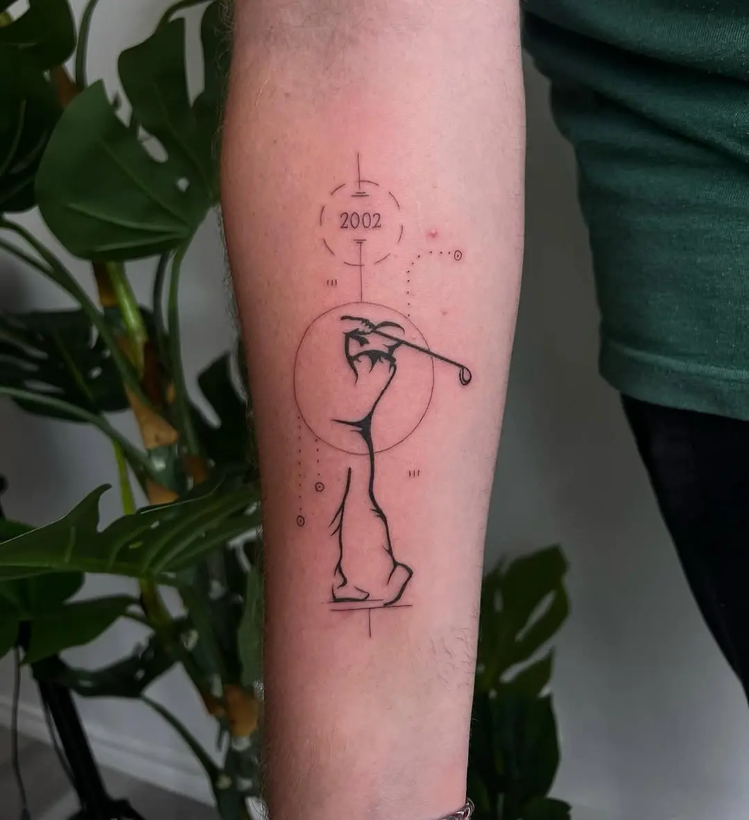 Minimalistic golf swing tattoo design inspiration