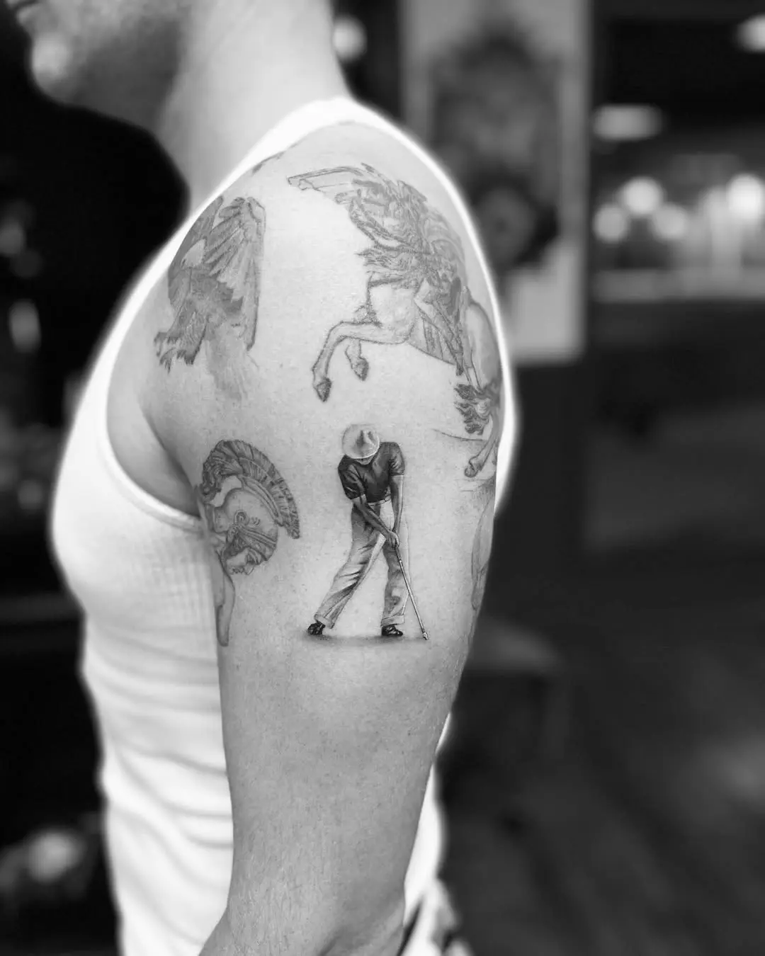 Stylish golf tattoo showcasing a swing action