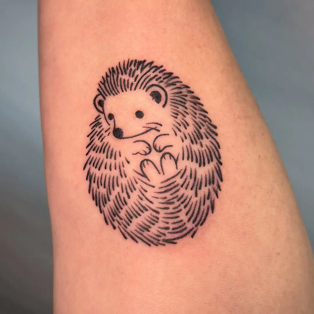 Charming hedgehog tattoo with intricate details