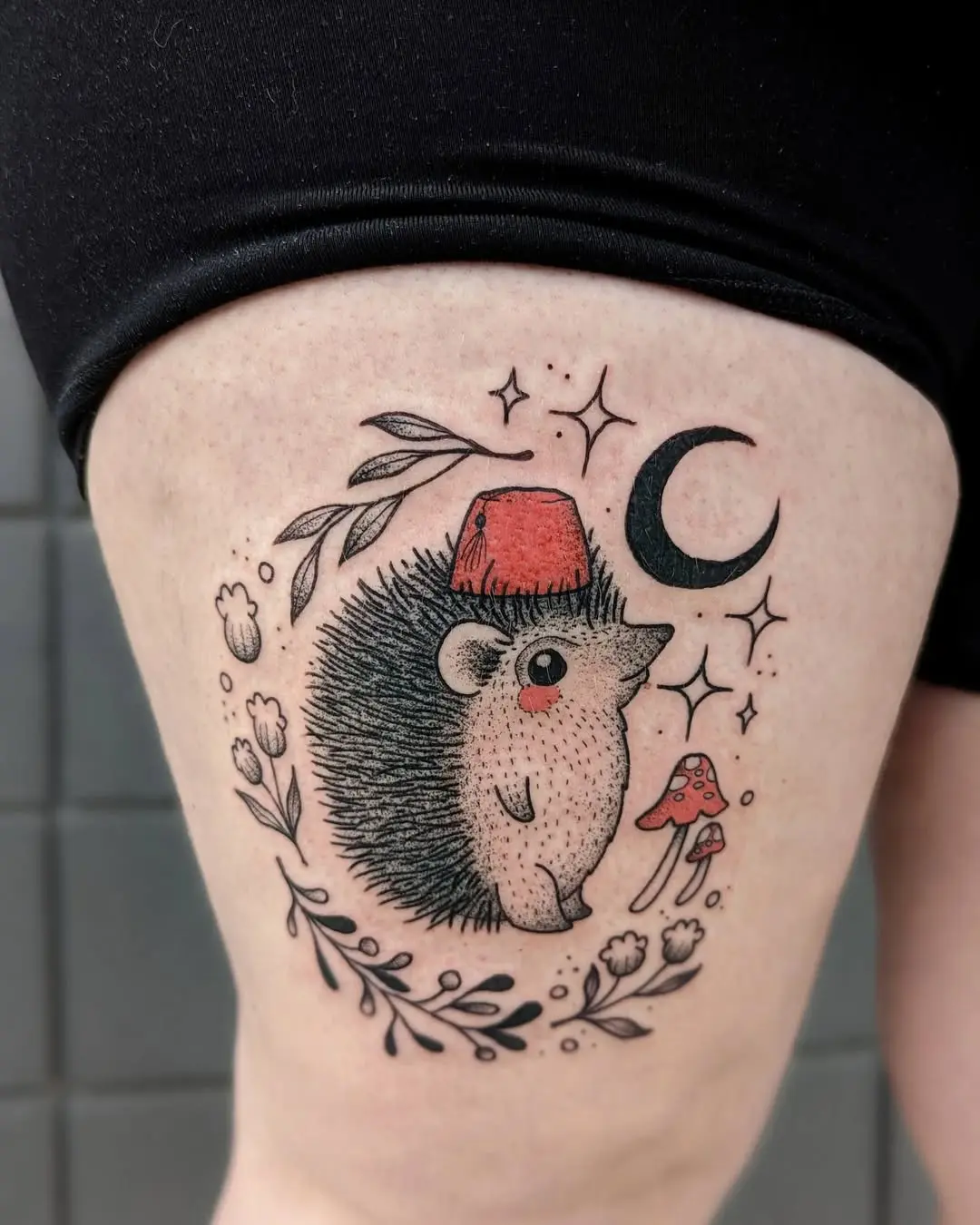 Charming hedgehog tattoo with whimsical elements