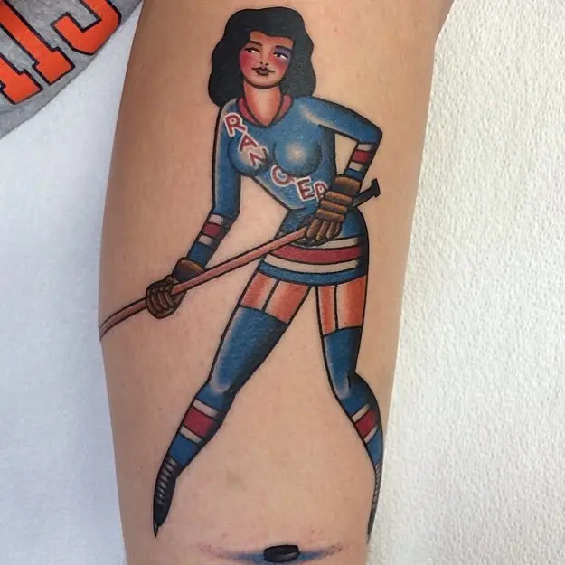 Bold Pin-Up Style Hockey Tattoo
