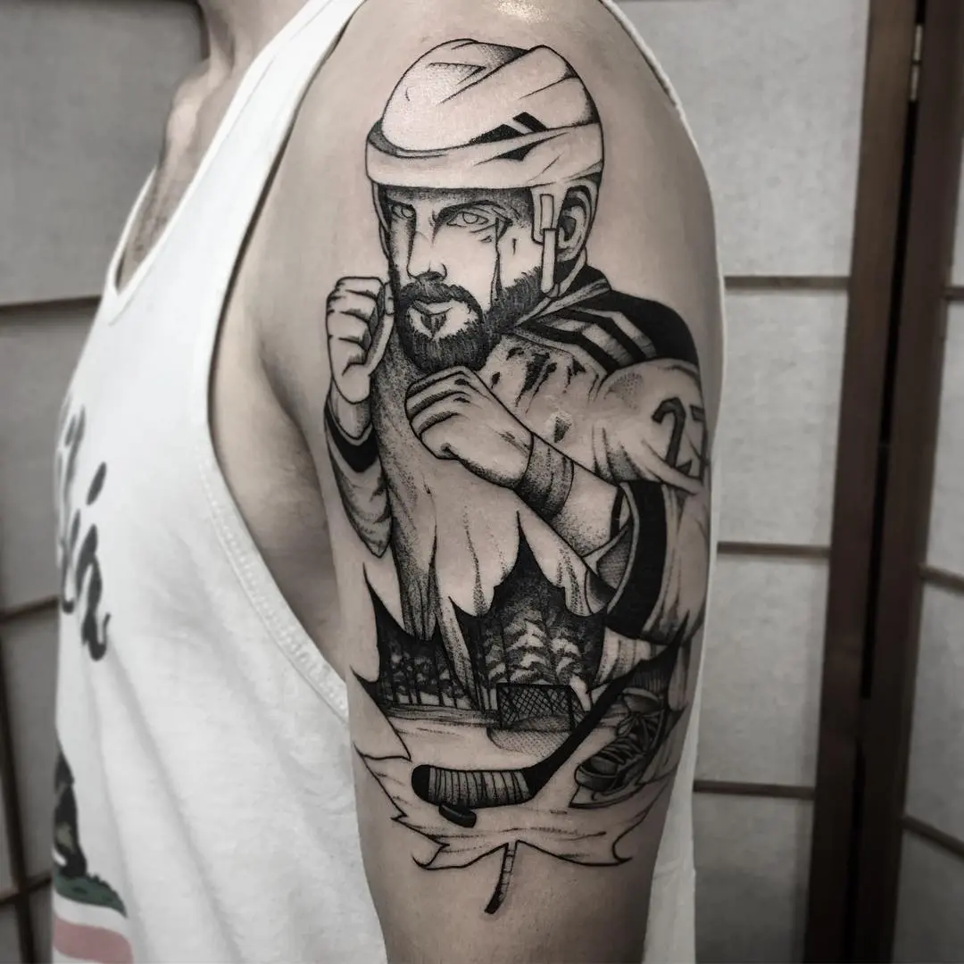 Dynamic hockey tattoo capturing the spirit of the sport