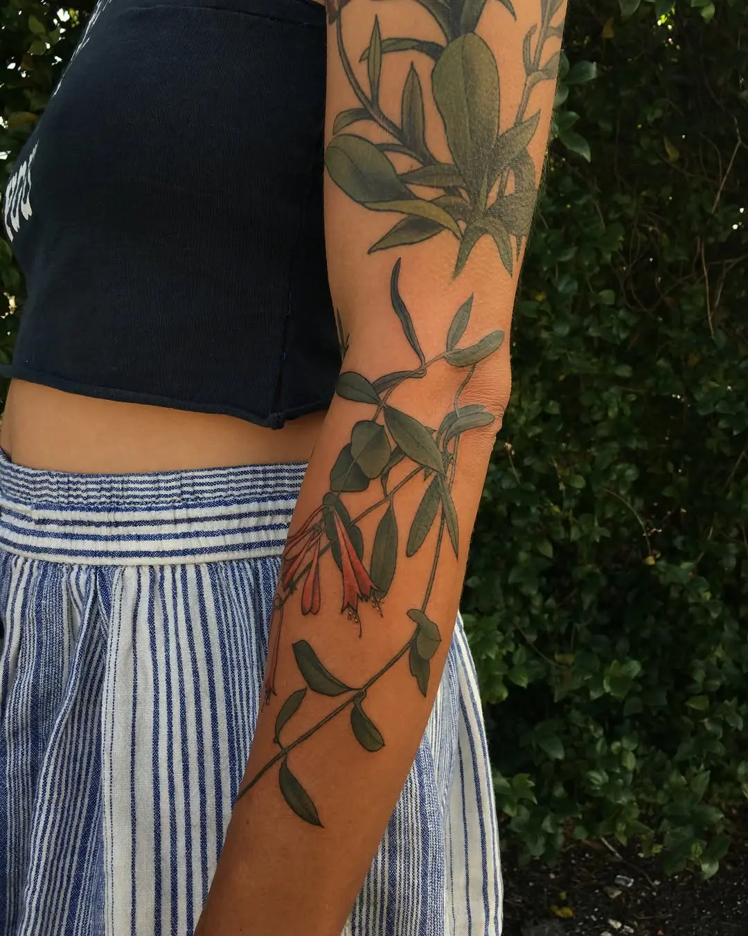 Elegant honeysuckle design adorning the arm