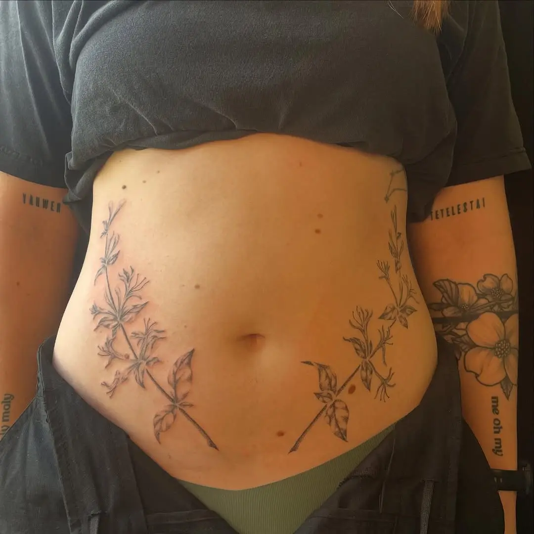 Beautiful honeysuckle tattoo design on the stomach