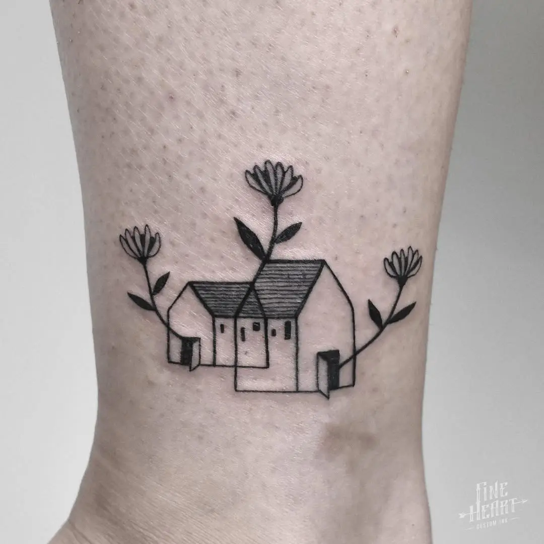 Charming minimalist house tattoo with flowers