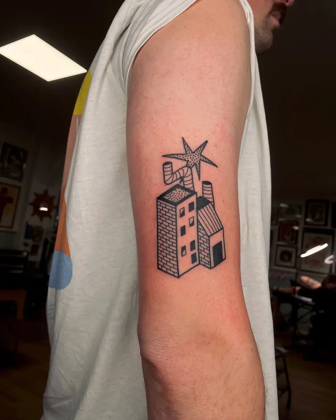 Stylized house tattoo with unique details