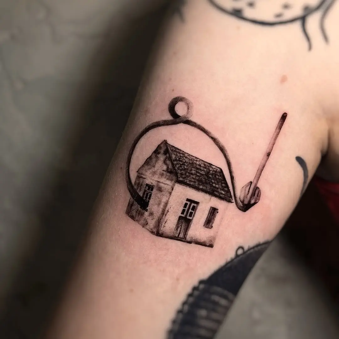 Artistic depiction of a house tattoo