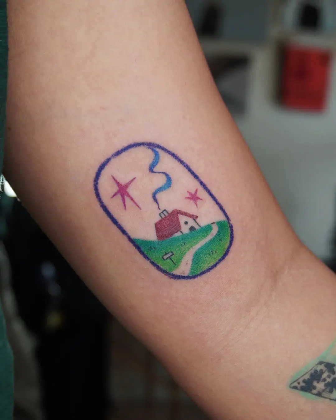 Charming house tattoo with whimsical design