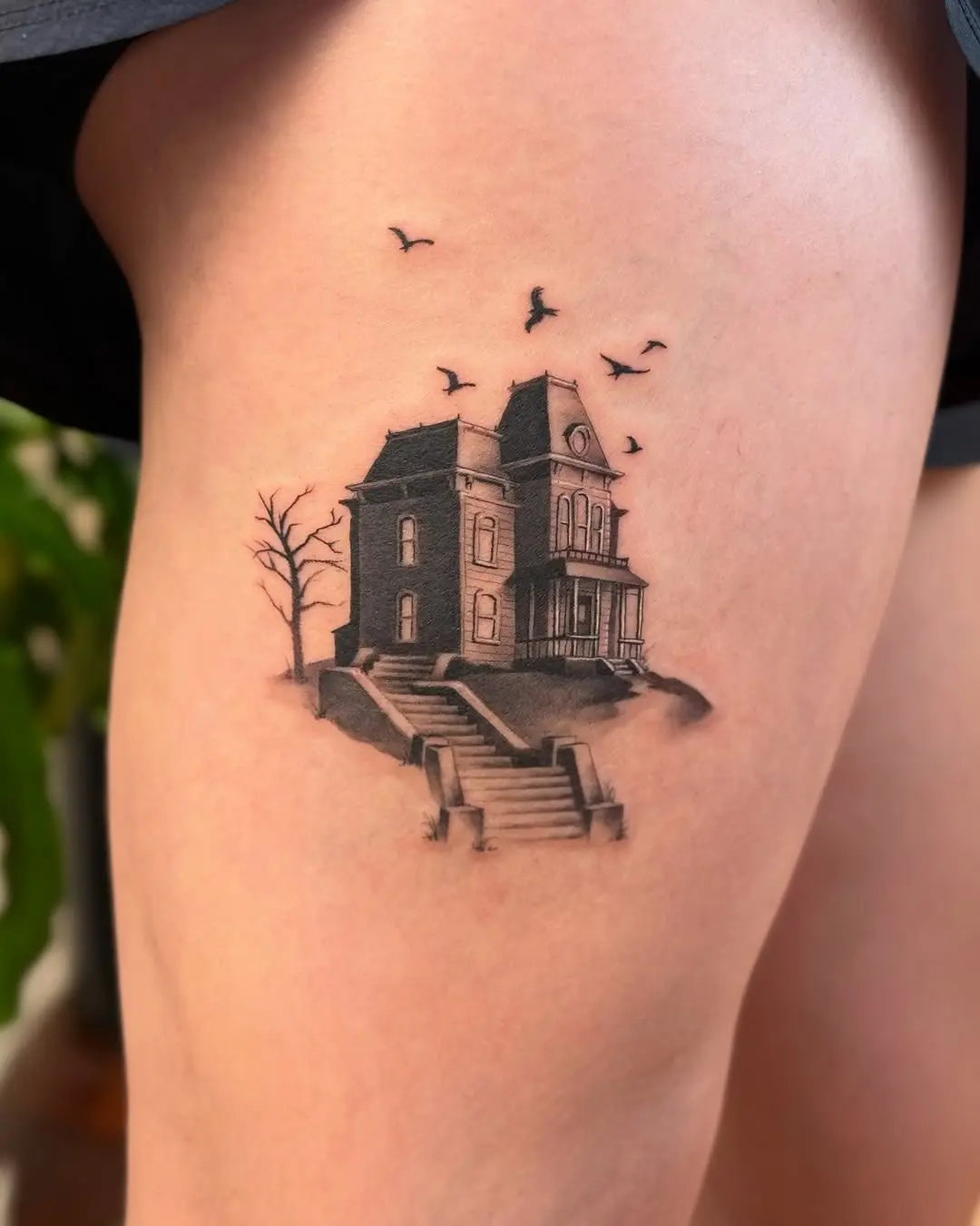 Haunting Elegance of a Vintage House Tattoo