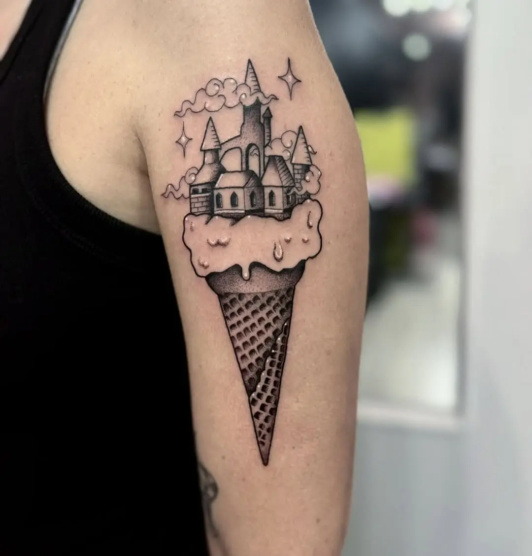 Whimsical ice cream tattoo with a castle theme