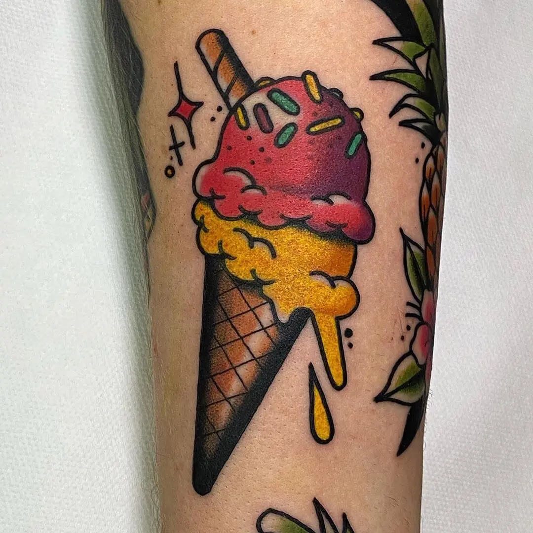 Vibrant ice cream tattoo with sprinkles appeal