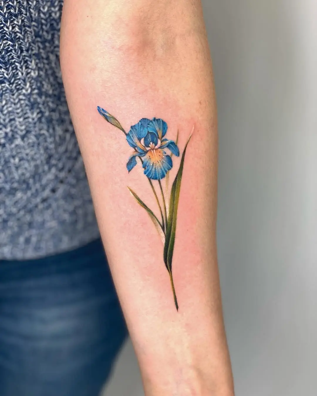 Stunning Iris Tattoo with Vibrant Blue Hues