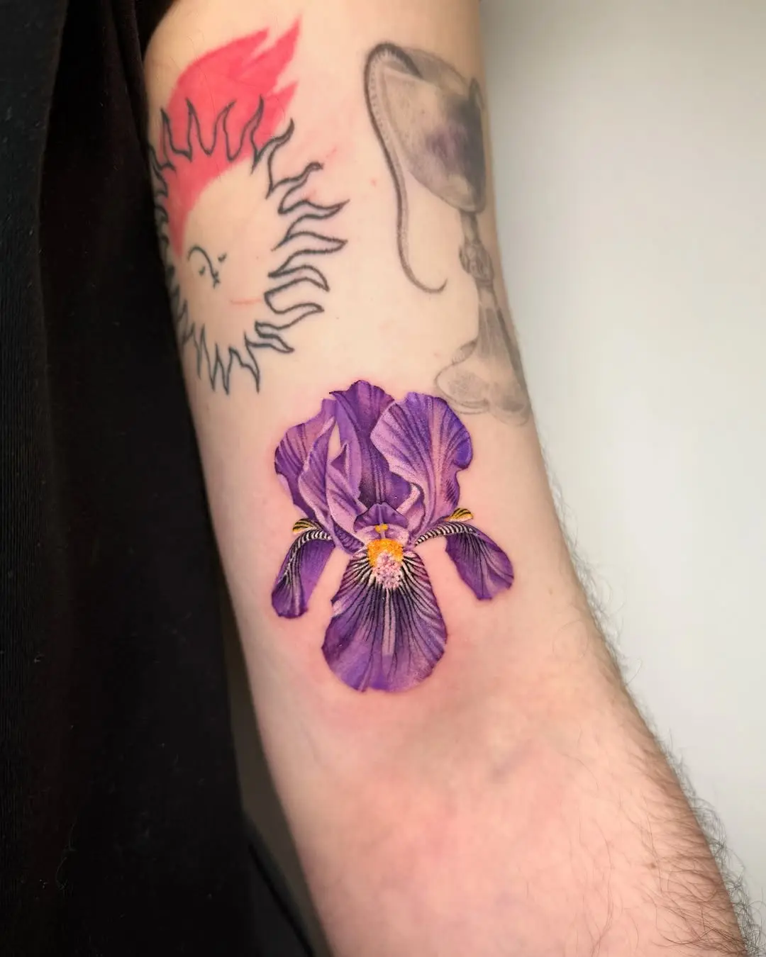 Stunning iris tattoo showcasing vibrant realism