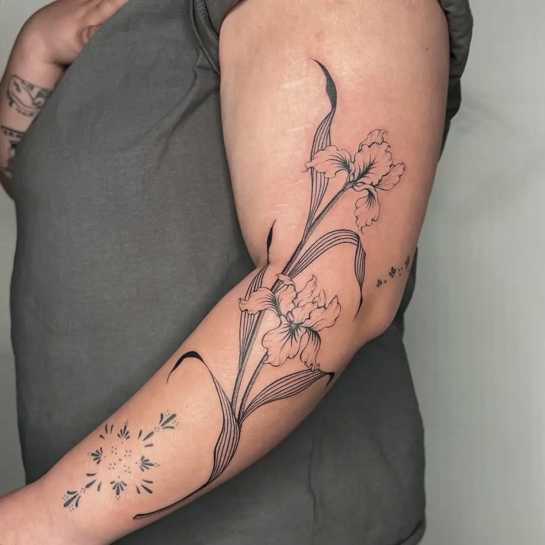Elegant iris tattoo showcasing floral beauty