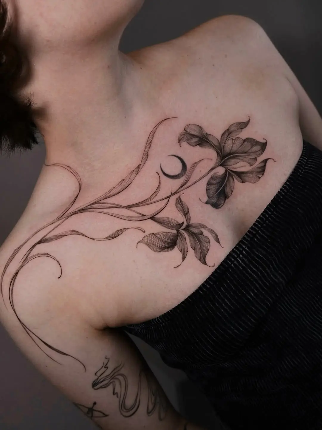 Stunning Iris Tattoos with Elegant Flowing Lines