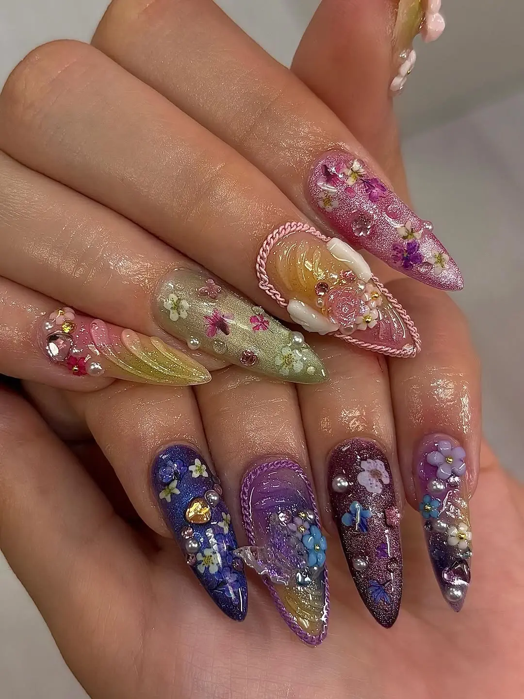 Stunning floral nail art in pastel colors.