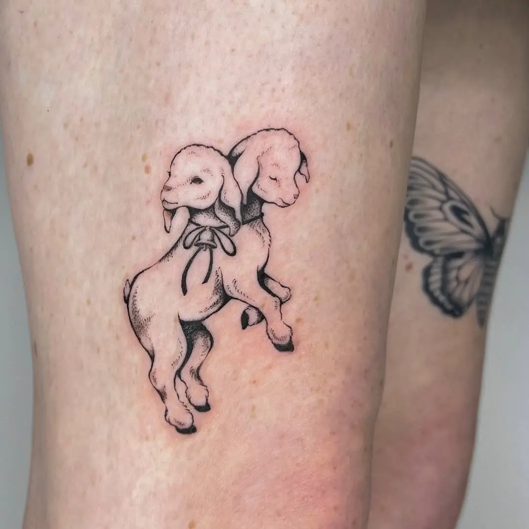 Adorable double goat kids tattoo design