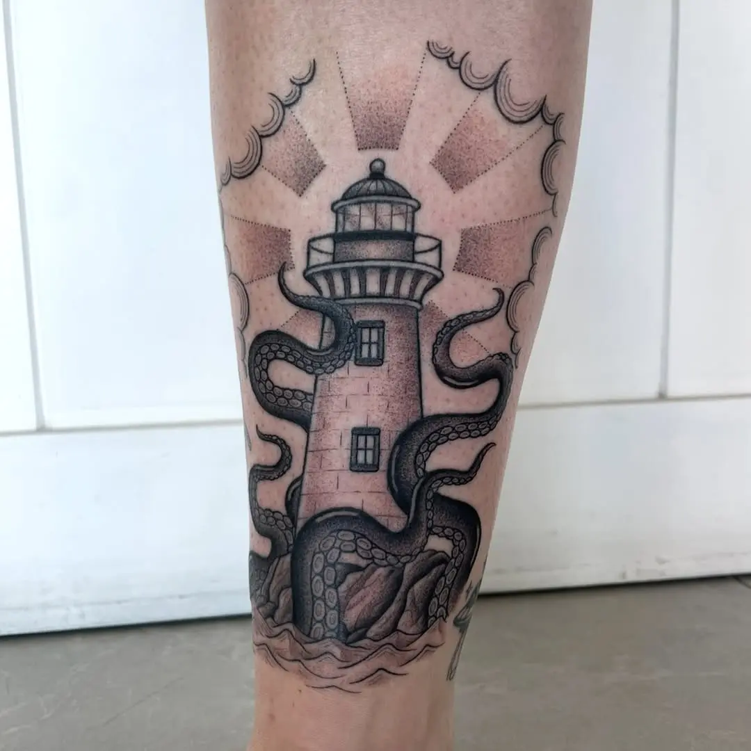 Unique lighthouse tattoo with octopus design