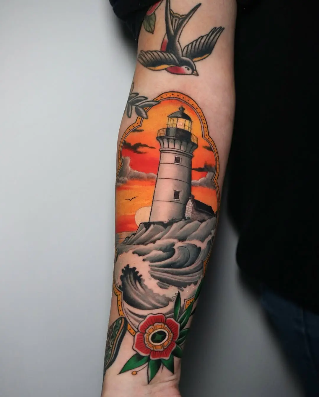 Stunning Lighthouse Tattoo with Sunrise Detail