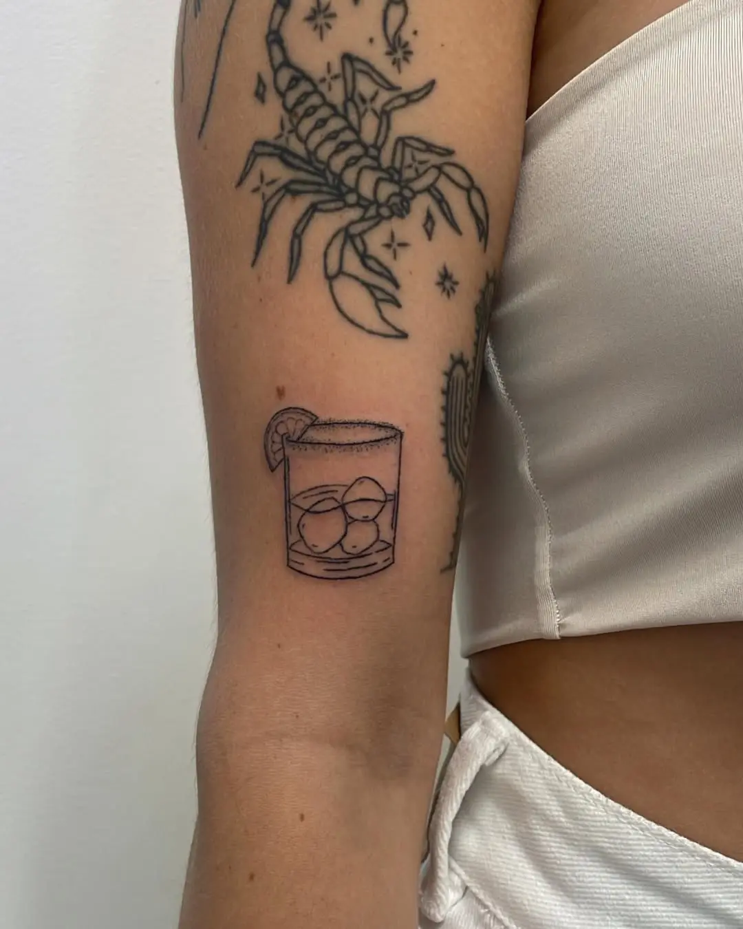Charming margarita tattoo with a citrus twist