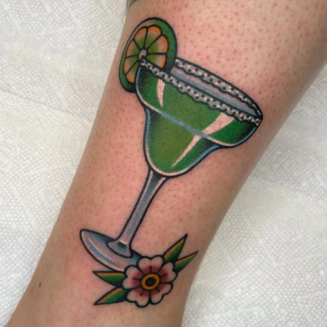 Colorful margarita tattoo with floral accents