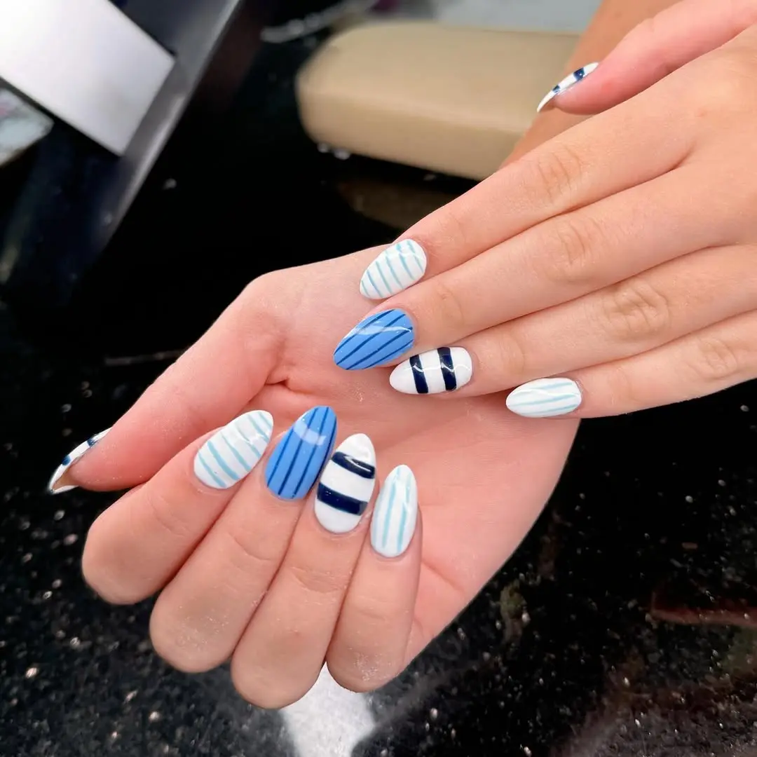 Stylish nautical nails with blue and white