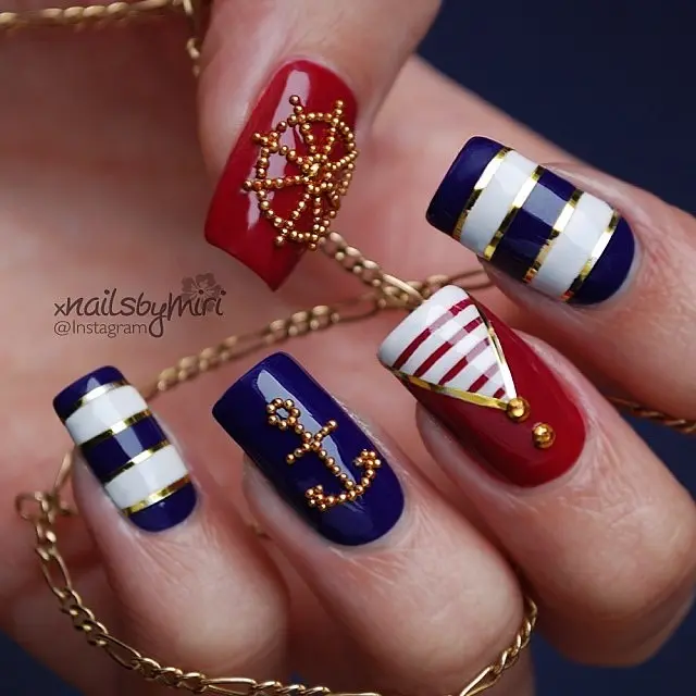 Stylish nautical nails with red and blue designs