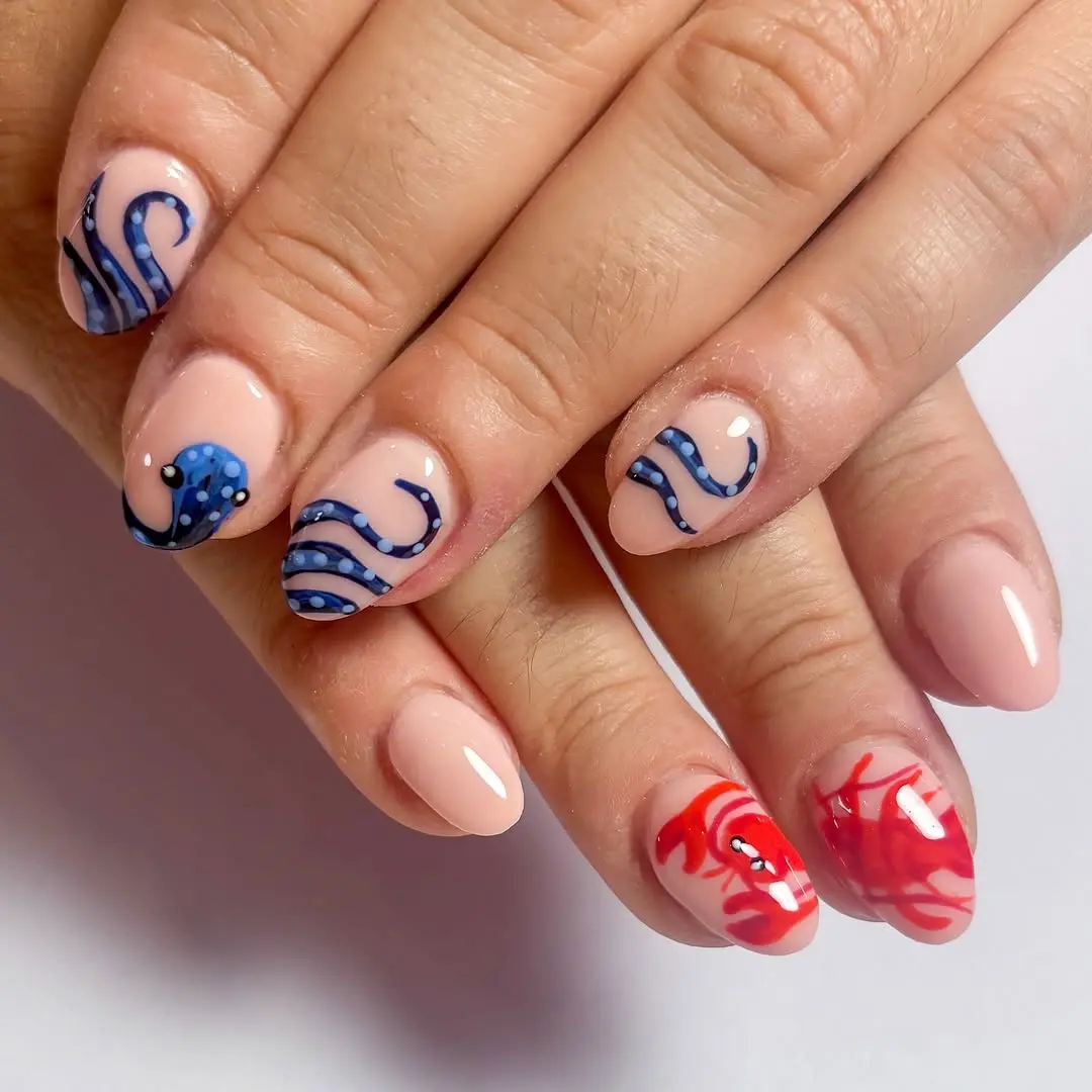 Vibrant nautical nails with ocean-themed designs