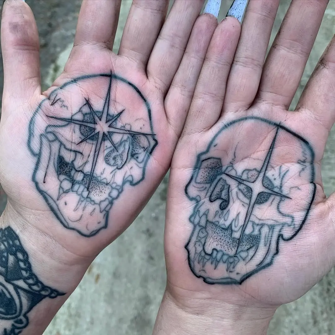 Striking palm skull tattoos with intricate details