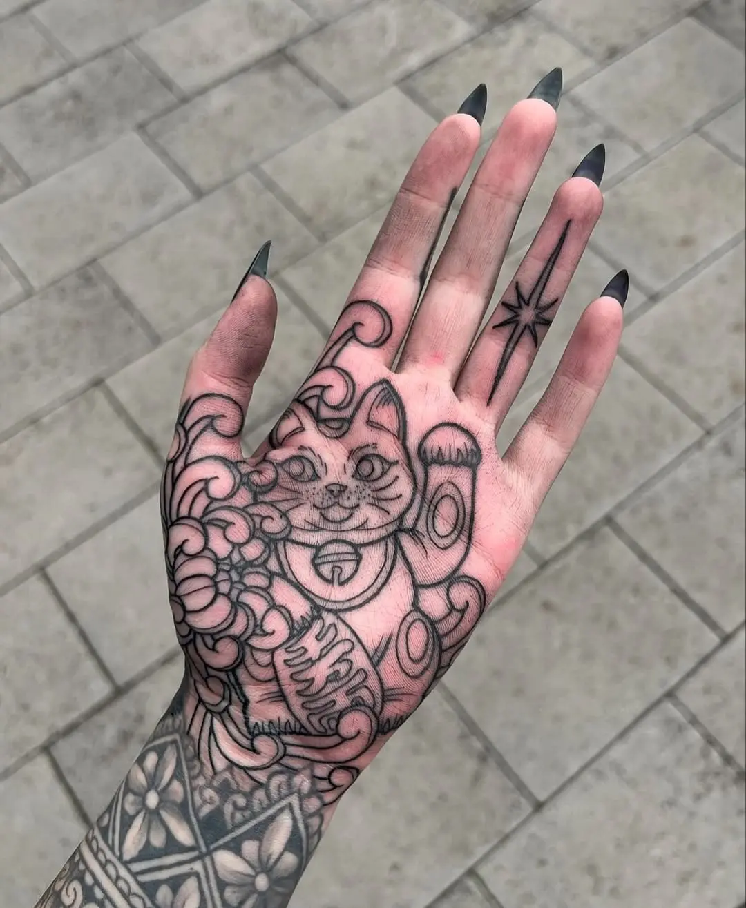 Unique Cat Design for Palm Tattoo Enthusiasts