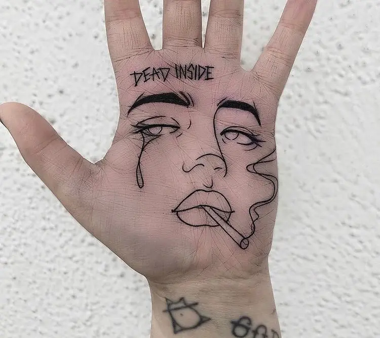 Bold palm tattoo with a unique expression