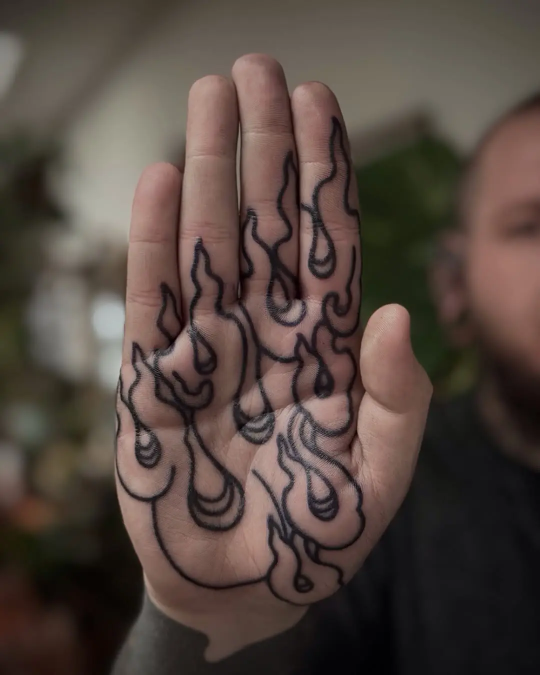 Unique Flame Design on Palm Tattoos