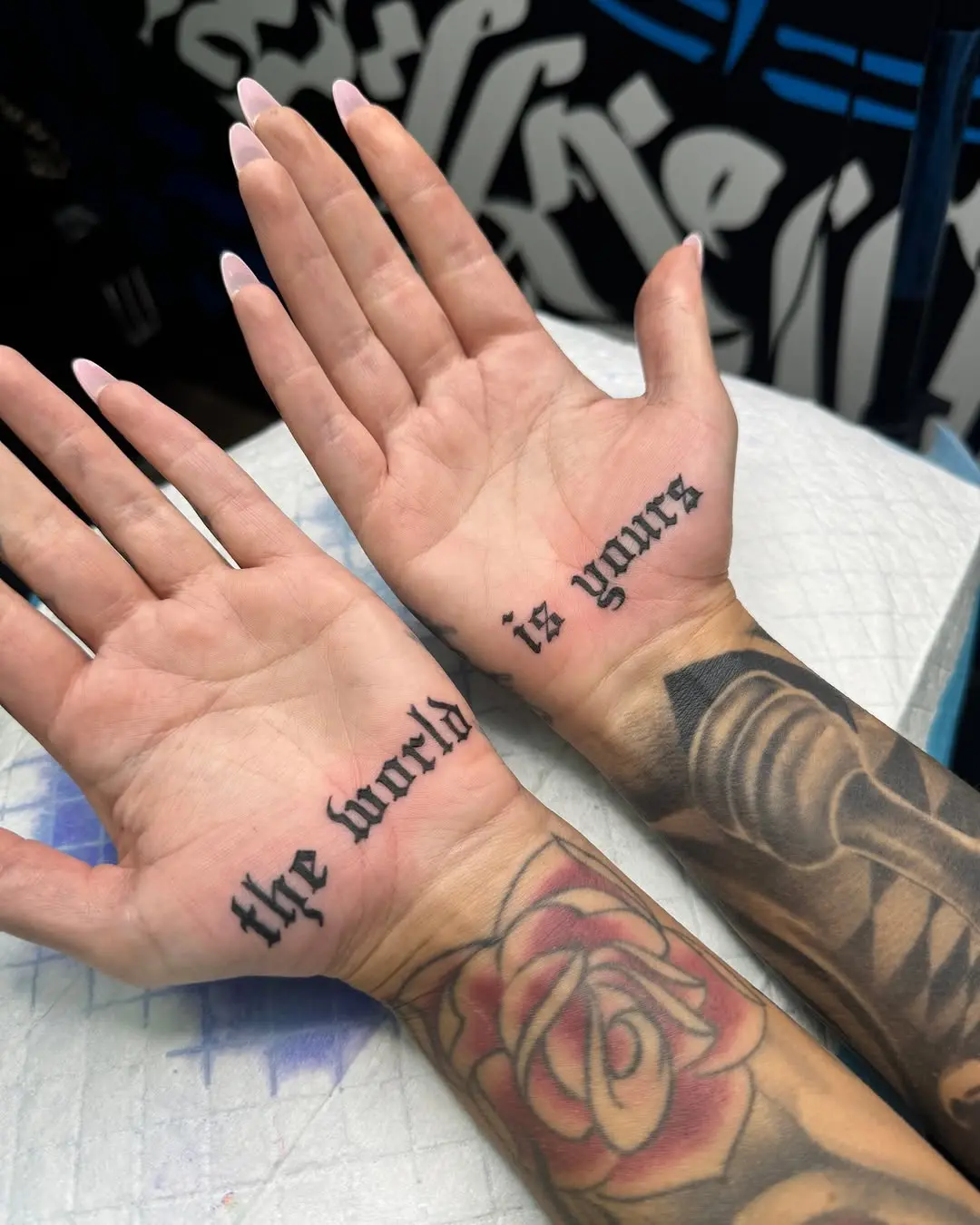 Stylish text tattoo on palm design