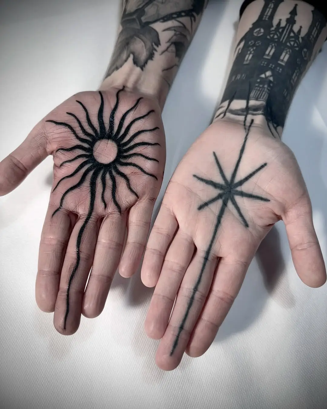 Unique sun and star palm tattoo designs