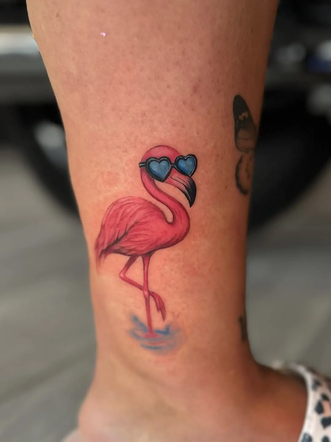 Charming flamingo tattoo with vibrant colors