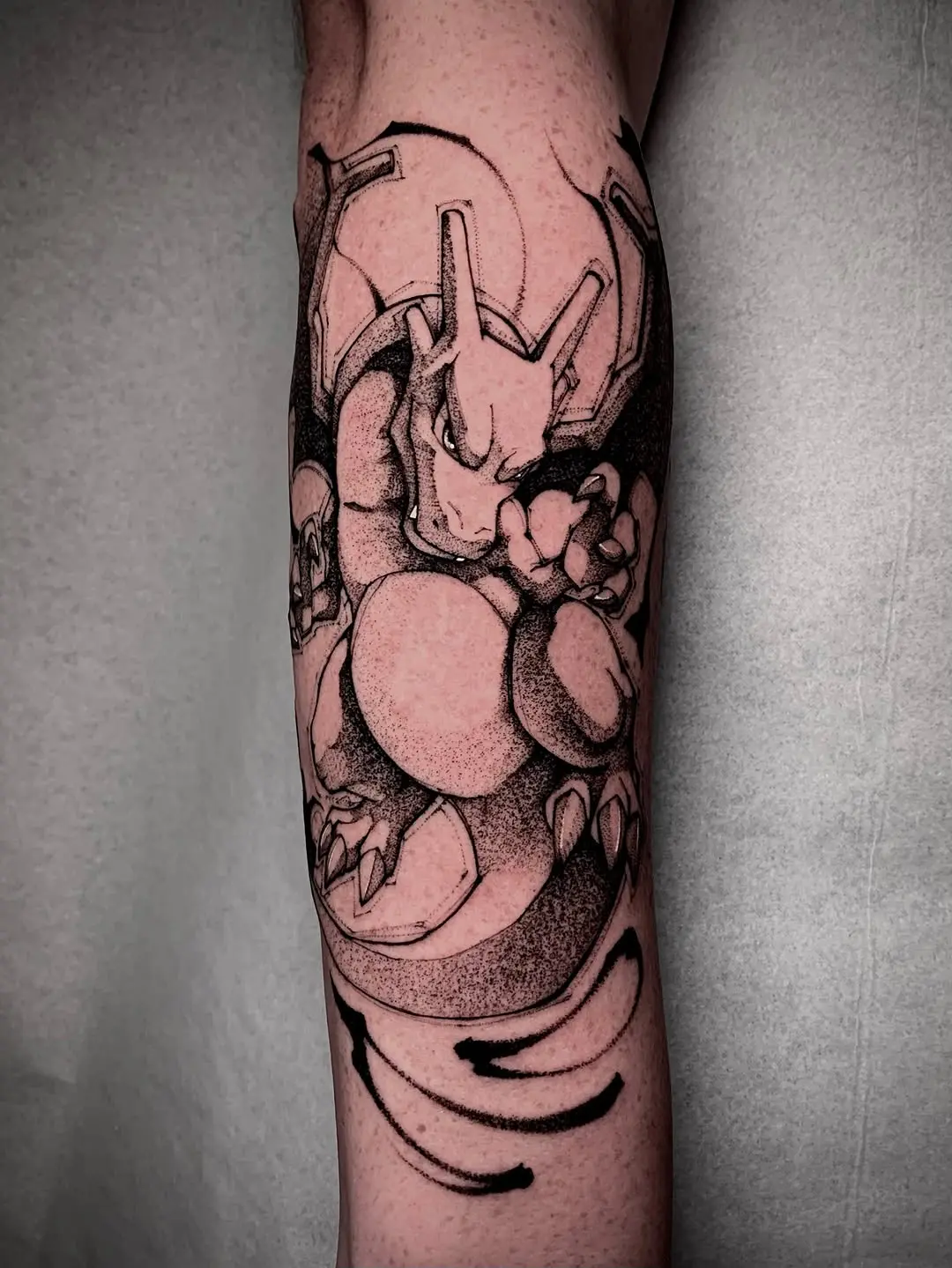 Epic Mewtwo Tattoo Showcasing Impressive Detail