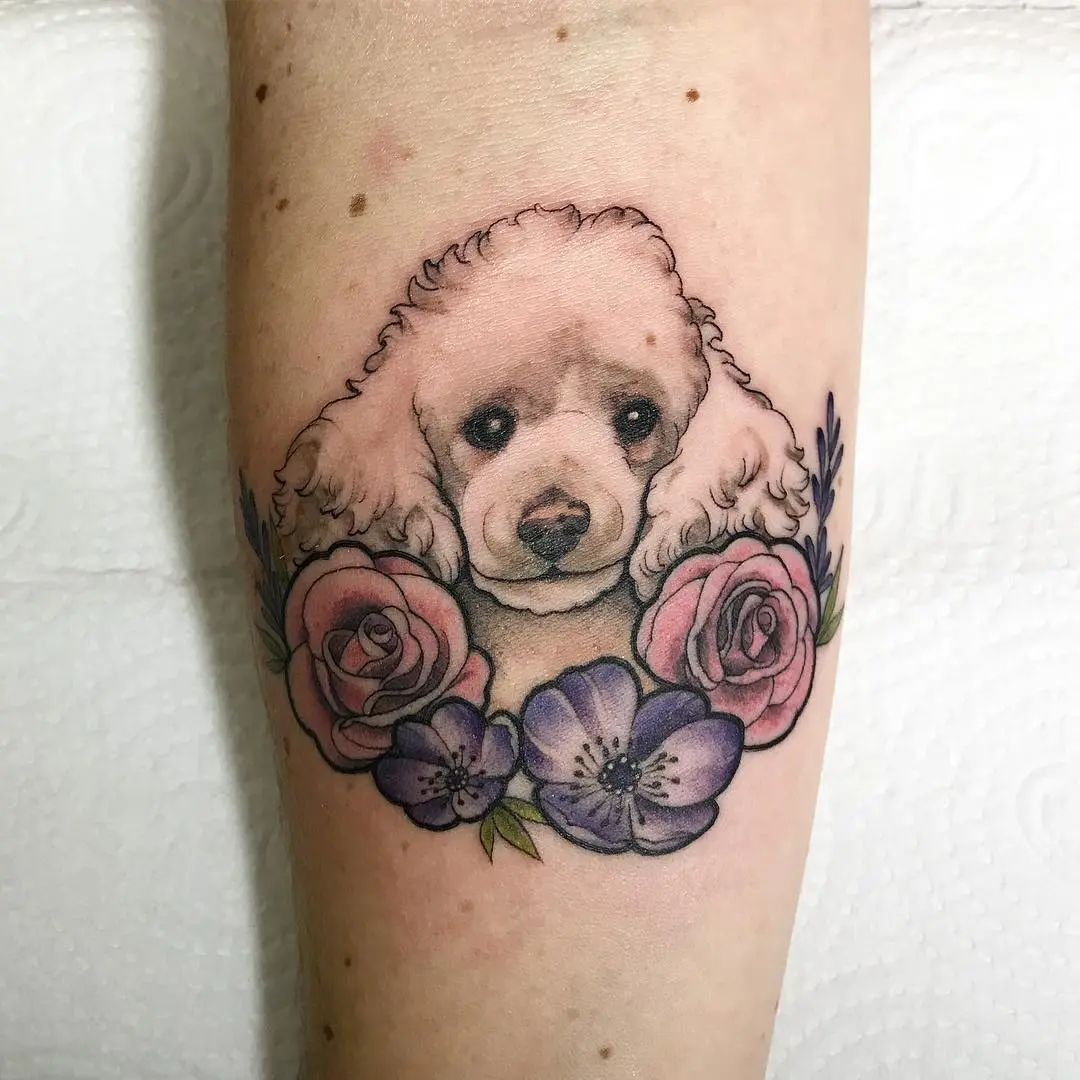 Charming Poodle Surrounded by Flowers
