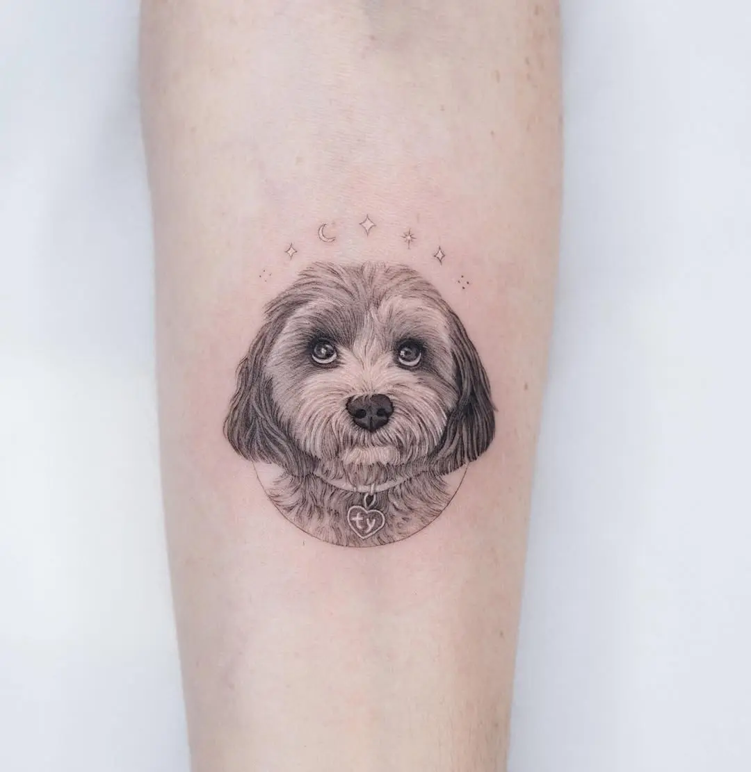 Intricate poodle tattoo with celestial elements