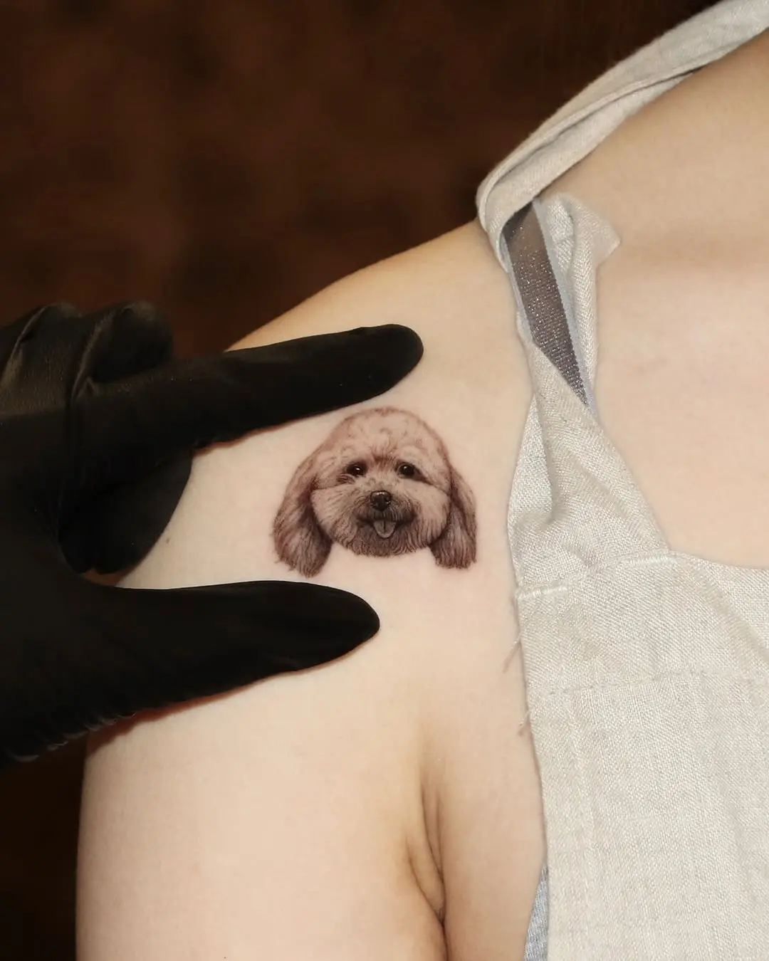 Intricate poodle tattoo showcasing realistic details