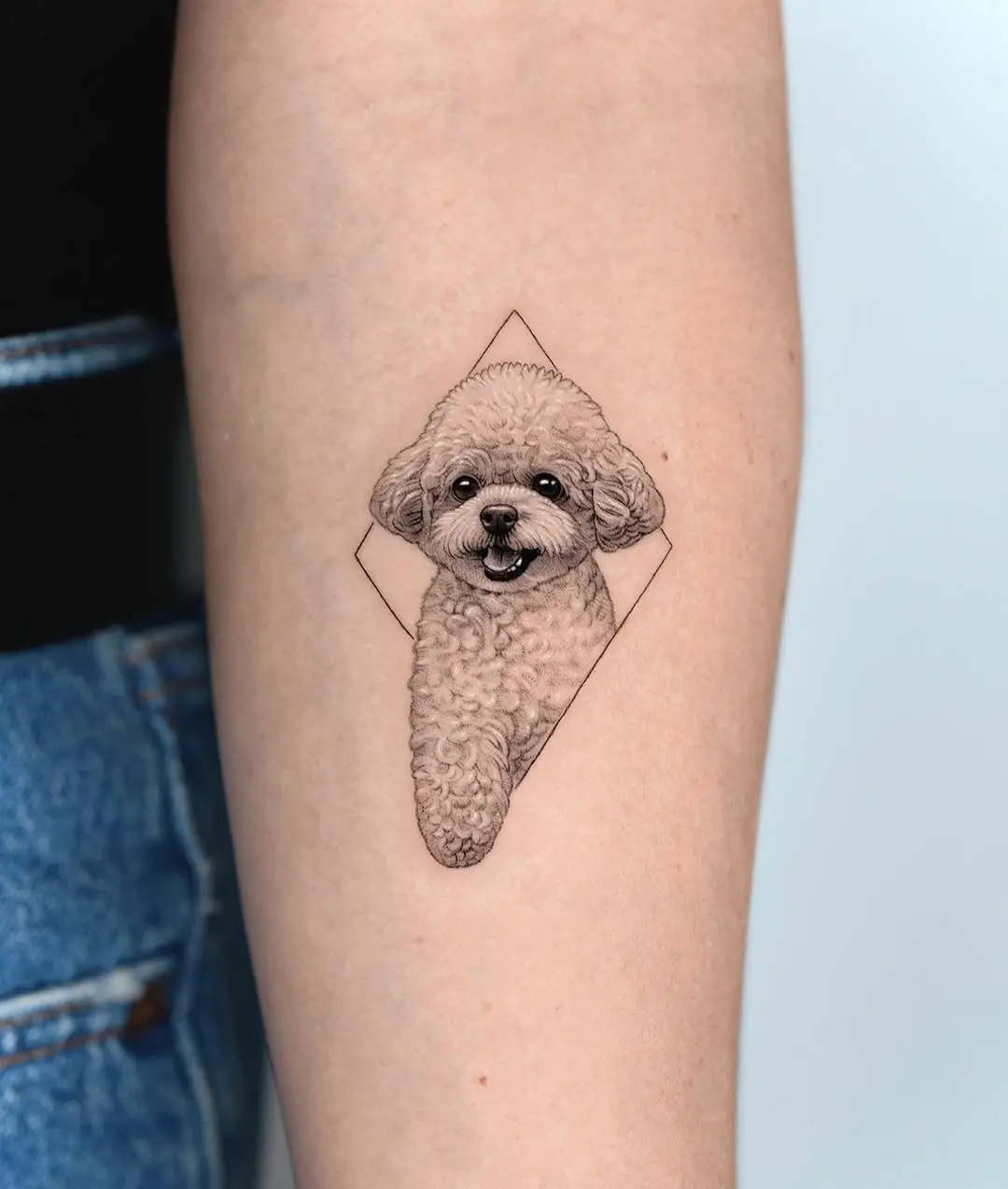 Adorable realistic poodle tattoo design