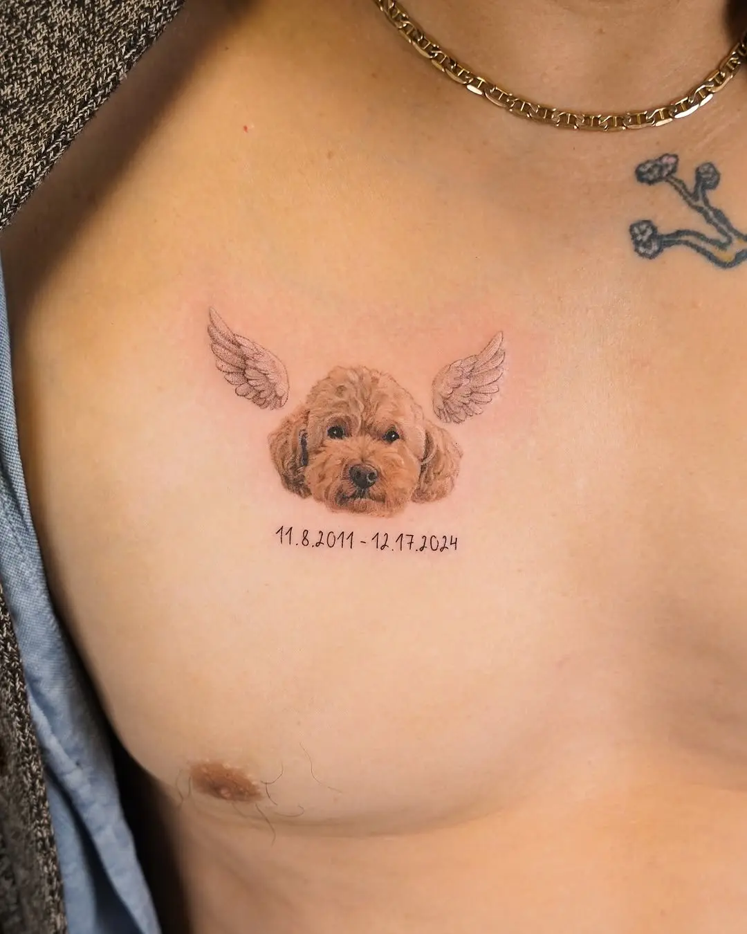 Whimsical poodle tattoo with angelic wings