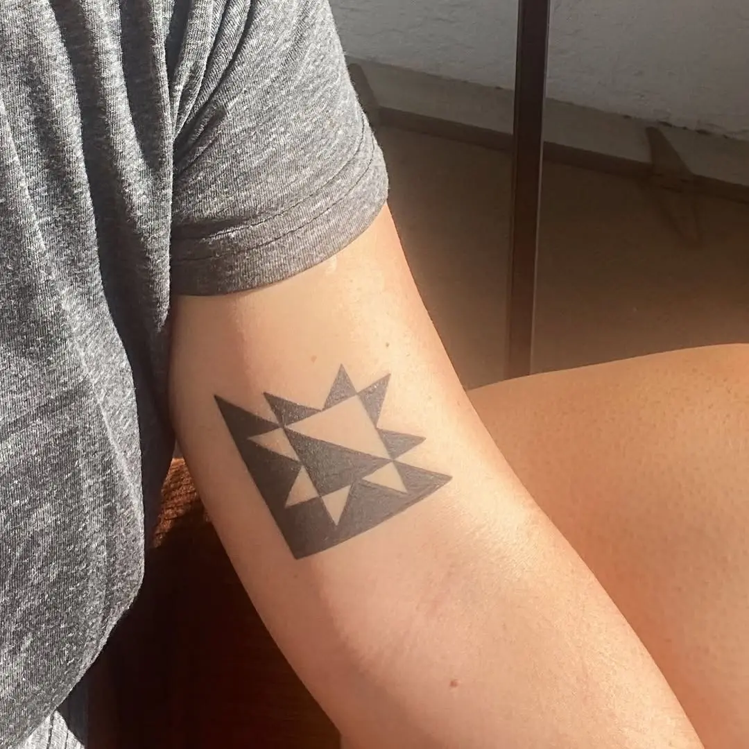 Stylish quilt-inspired star tattoo design