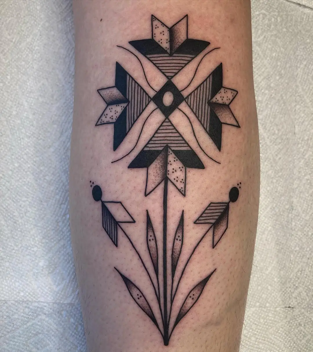 Unique geometric flower quilt tattoo design