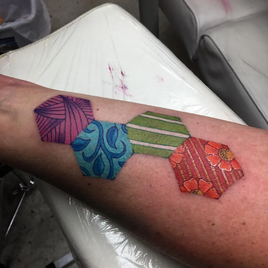 Colorful quilt-inspired hexagon tattoos