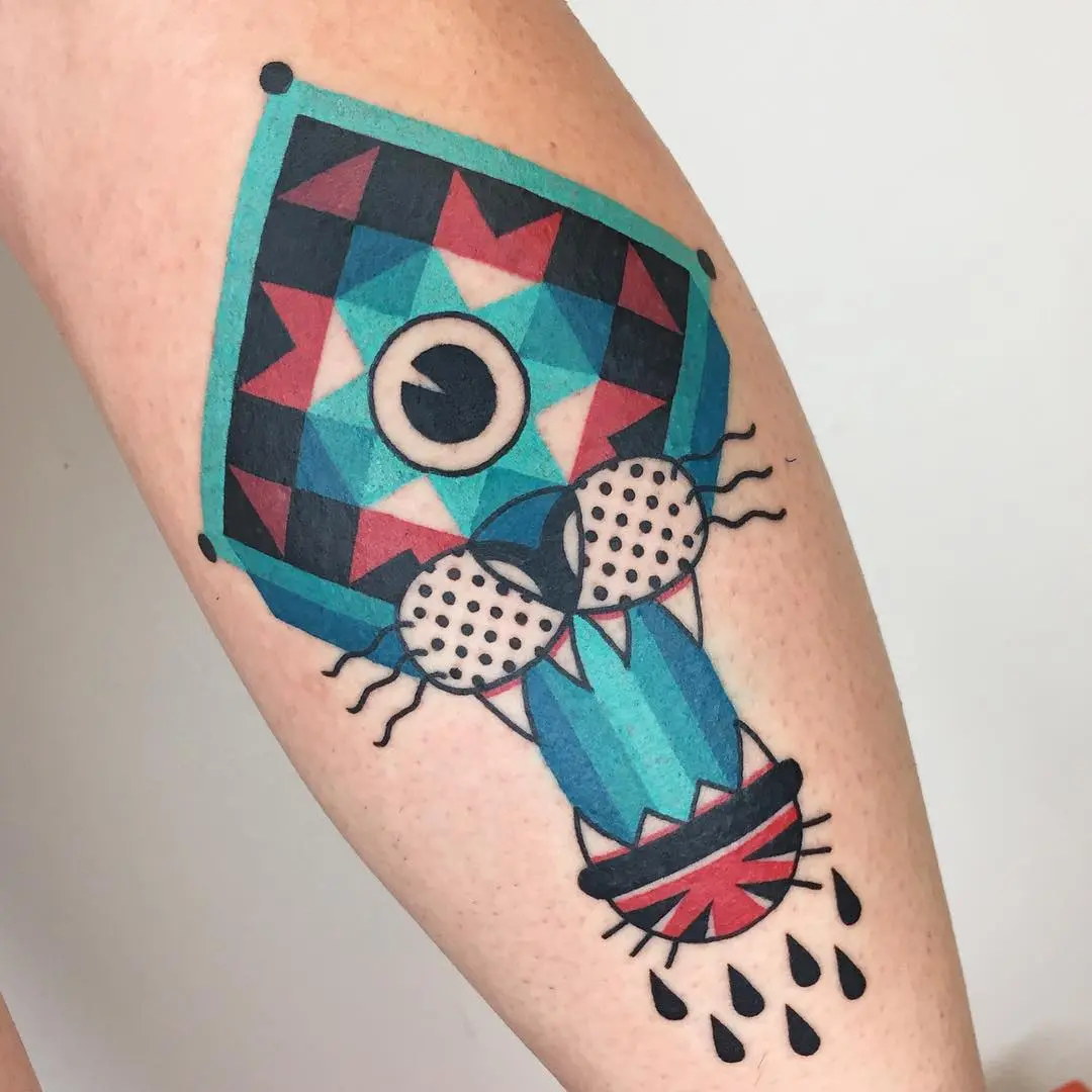 Colorful quilt-inspired animal tattoo design