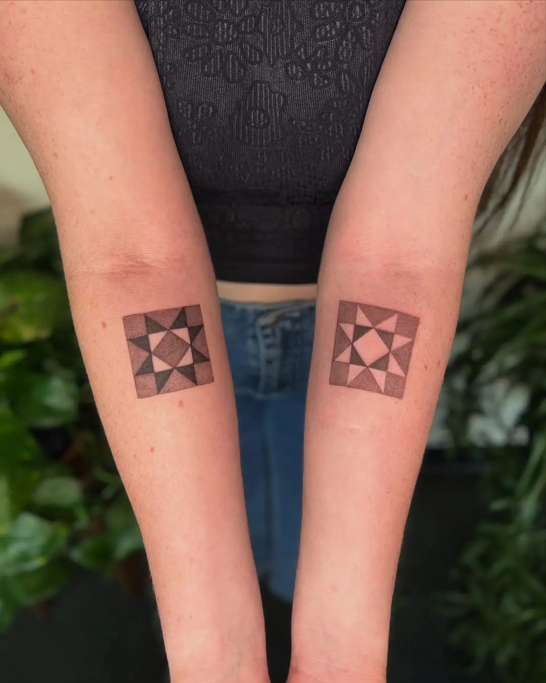 Stylish quilt tattoo with geometric symmetry